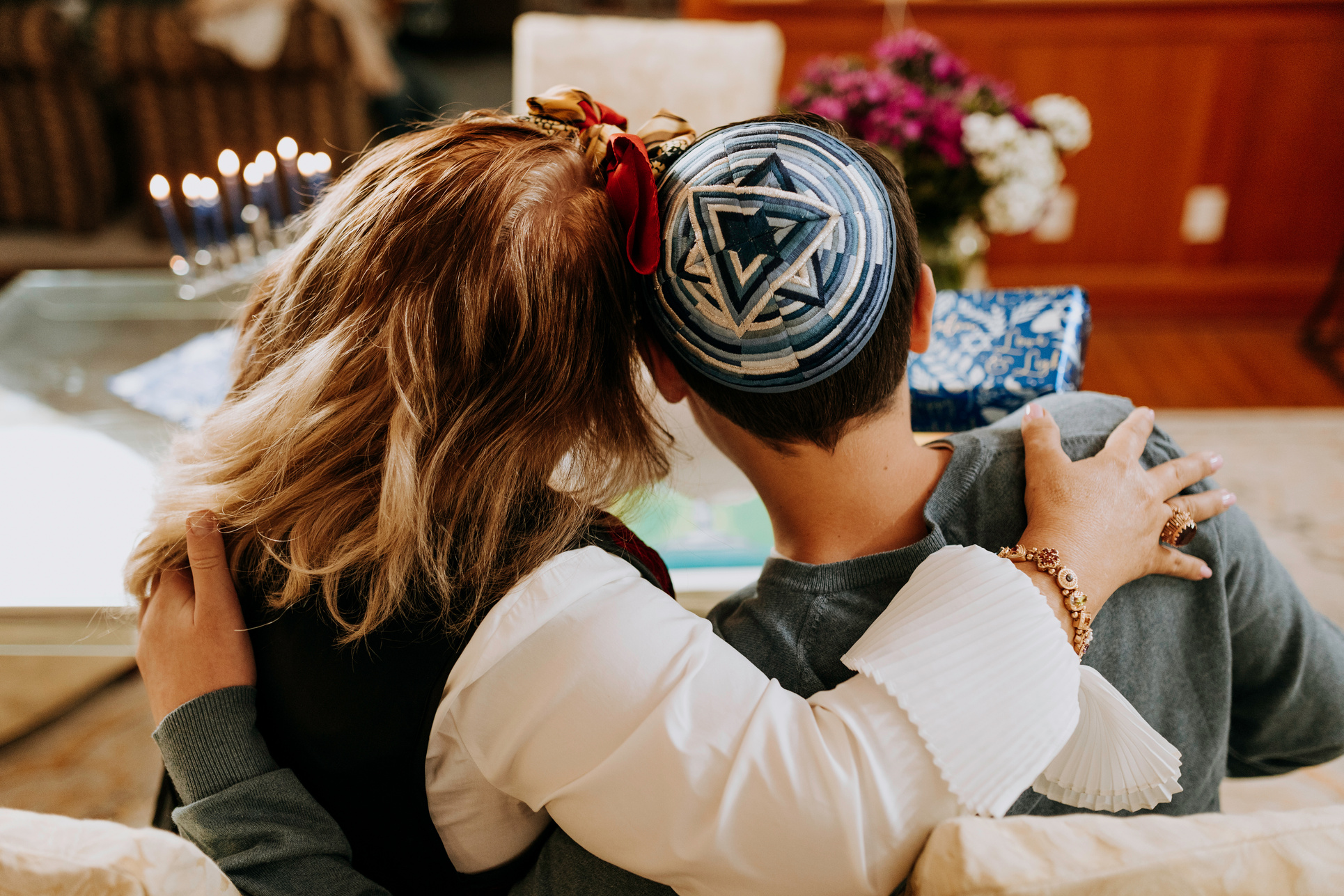 Photo Of People Leaning Their Heads To Each Other